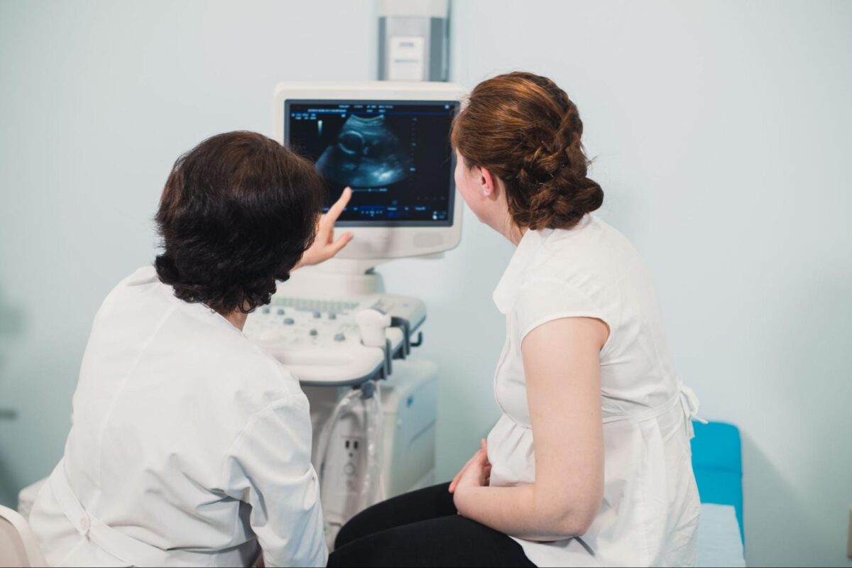 Woman reviewing her cervical cancer screening with her doctor