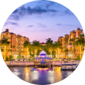Waterfront photo of Naples Florida at sunset with colorful buildings and marina representing Centella Florida medical imaging solutions