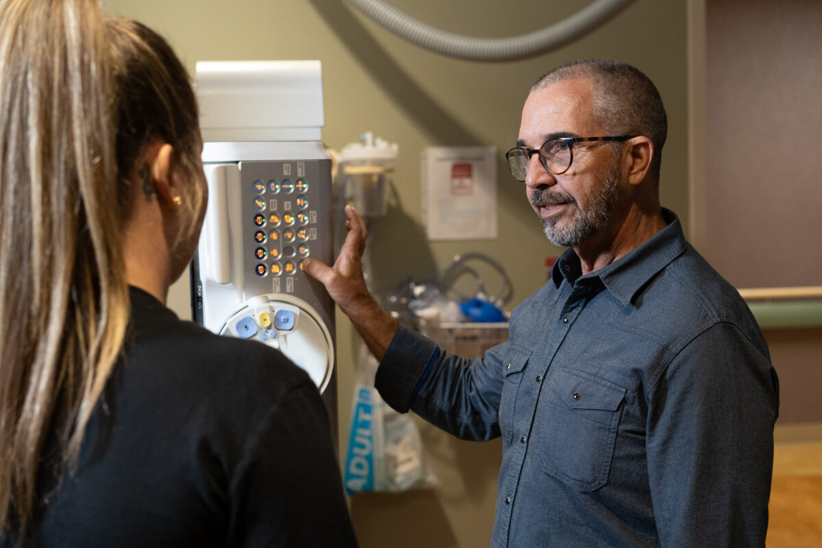 Centella engineer demonstrating Siemens medical imaging equipment during training session